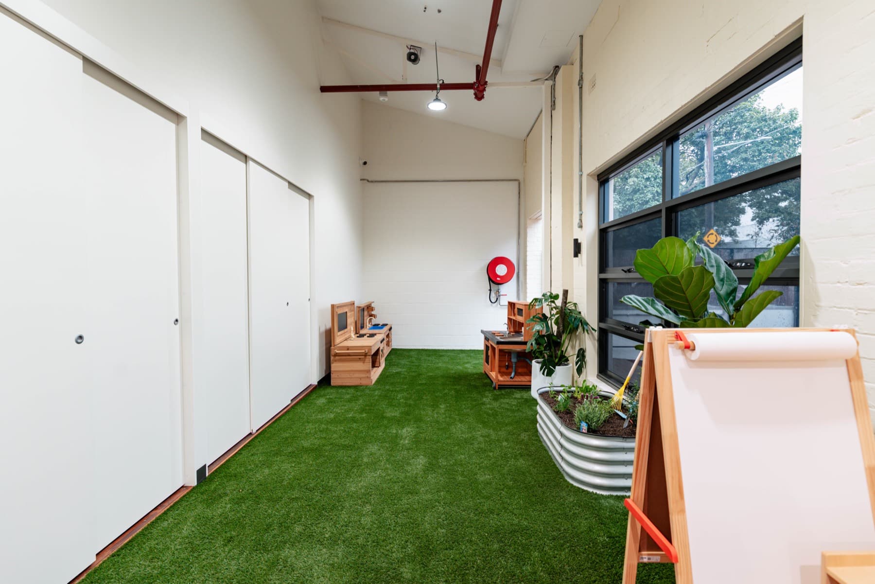 An indoor green play space at Rosebery